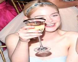 Elle Fanning consuming alcohol